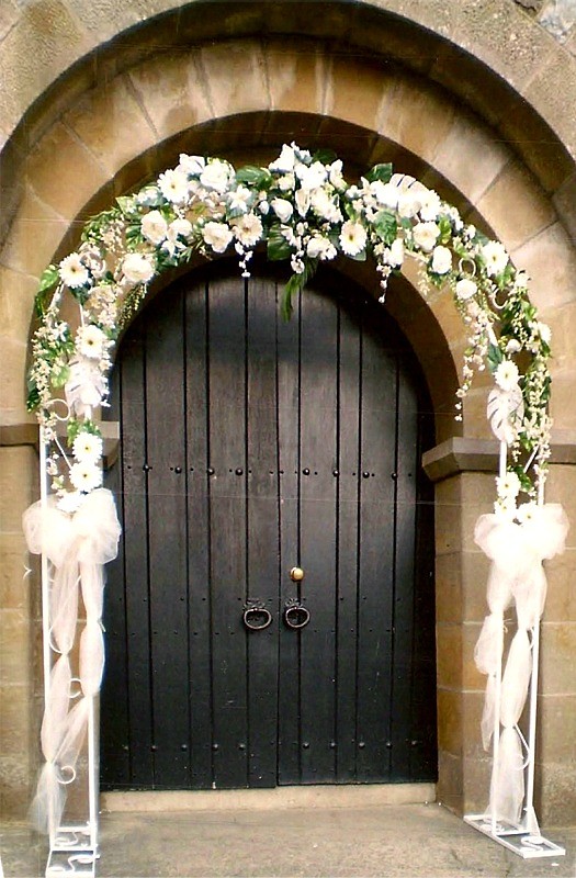 Floral Archway around Chapel entrance by Flowers by Hughes Florist Shop, Monaghan Town, Ireland